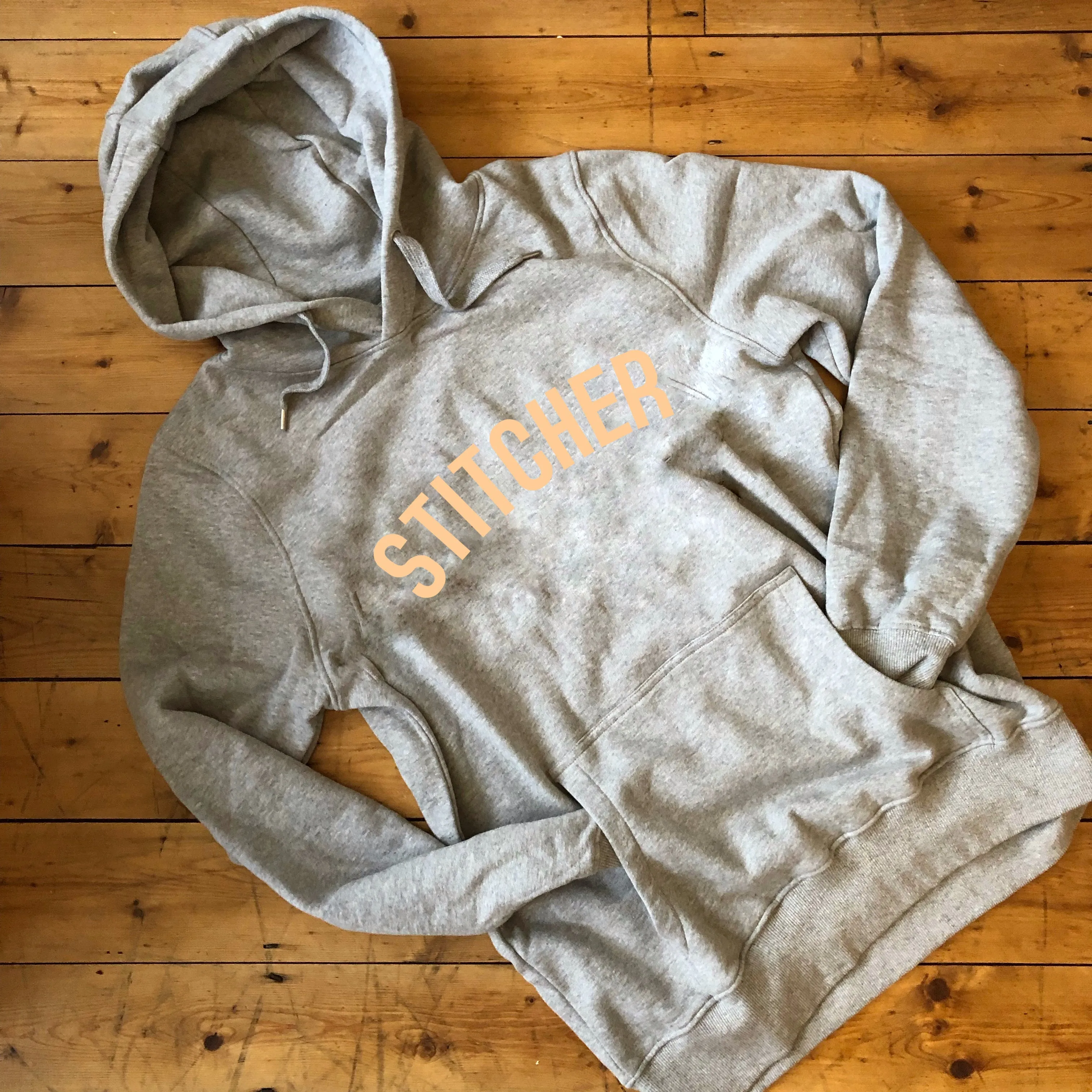 STITCHER Hoodie - 100% Organic Fairtrade Cotton - Pastel Font