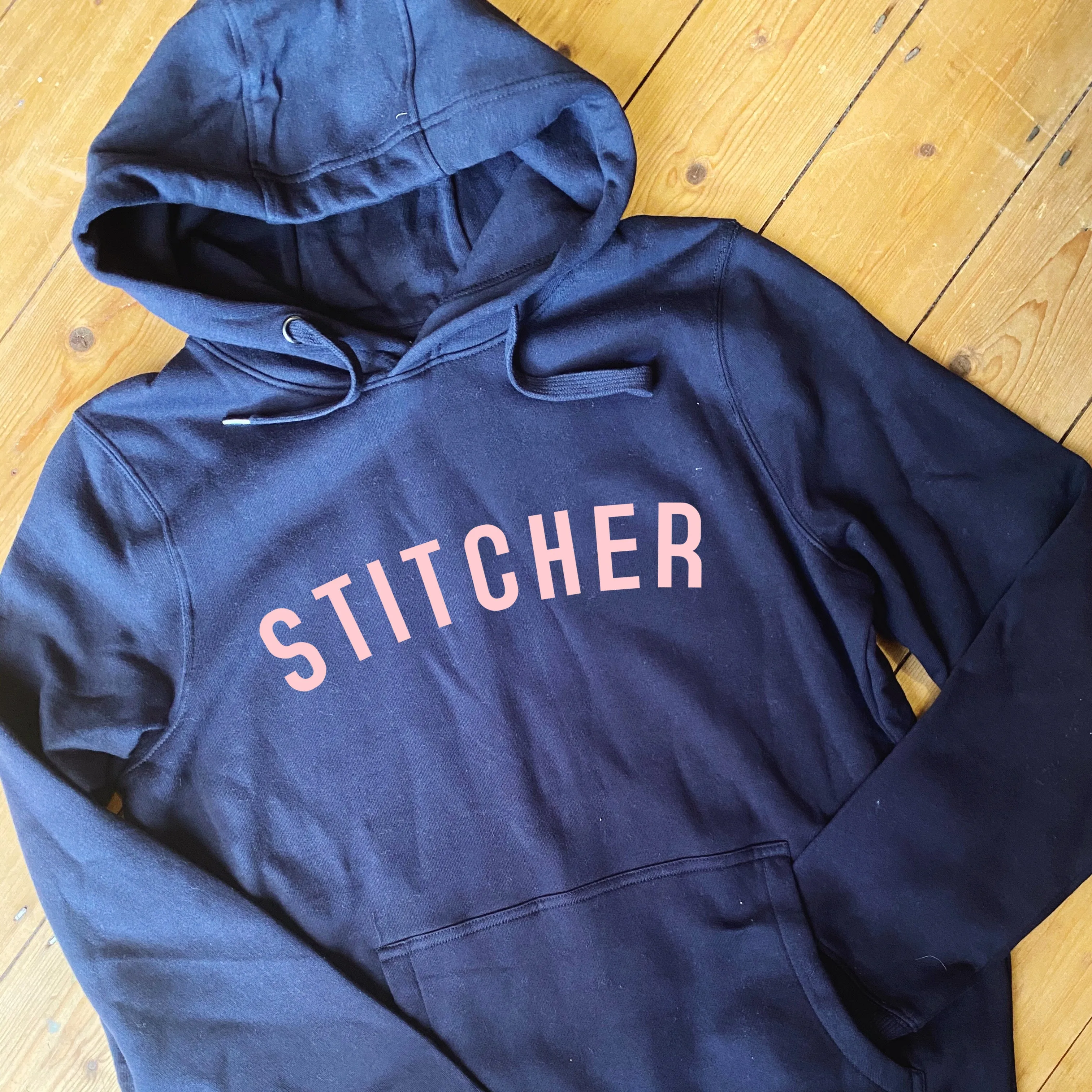 STITCHER Hoodie - 100% Organic Fairtrade Cotton - Pastel Font