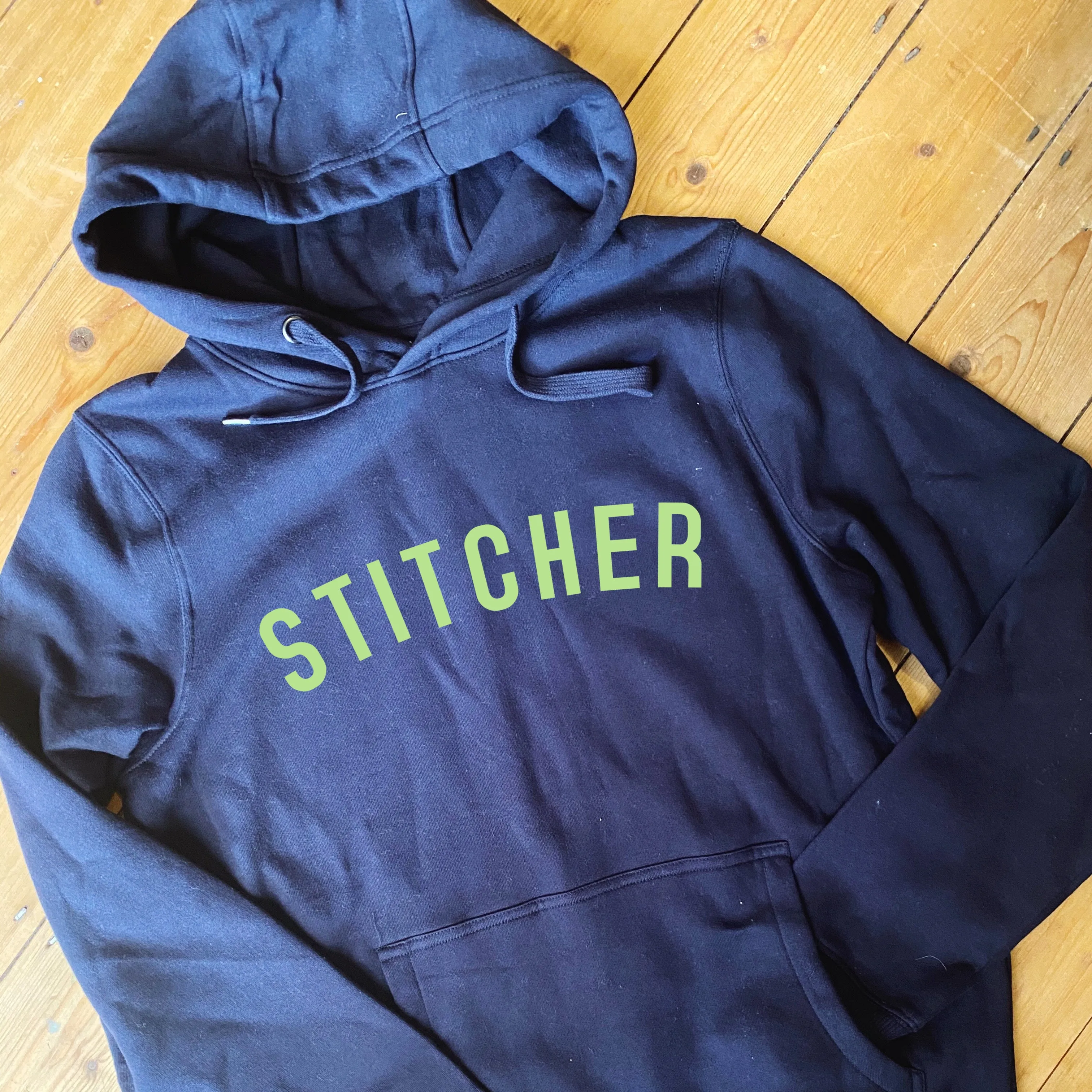 STITCHER Hoodie - 100% Organic Fairtrade Cotton - Pastel Font