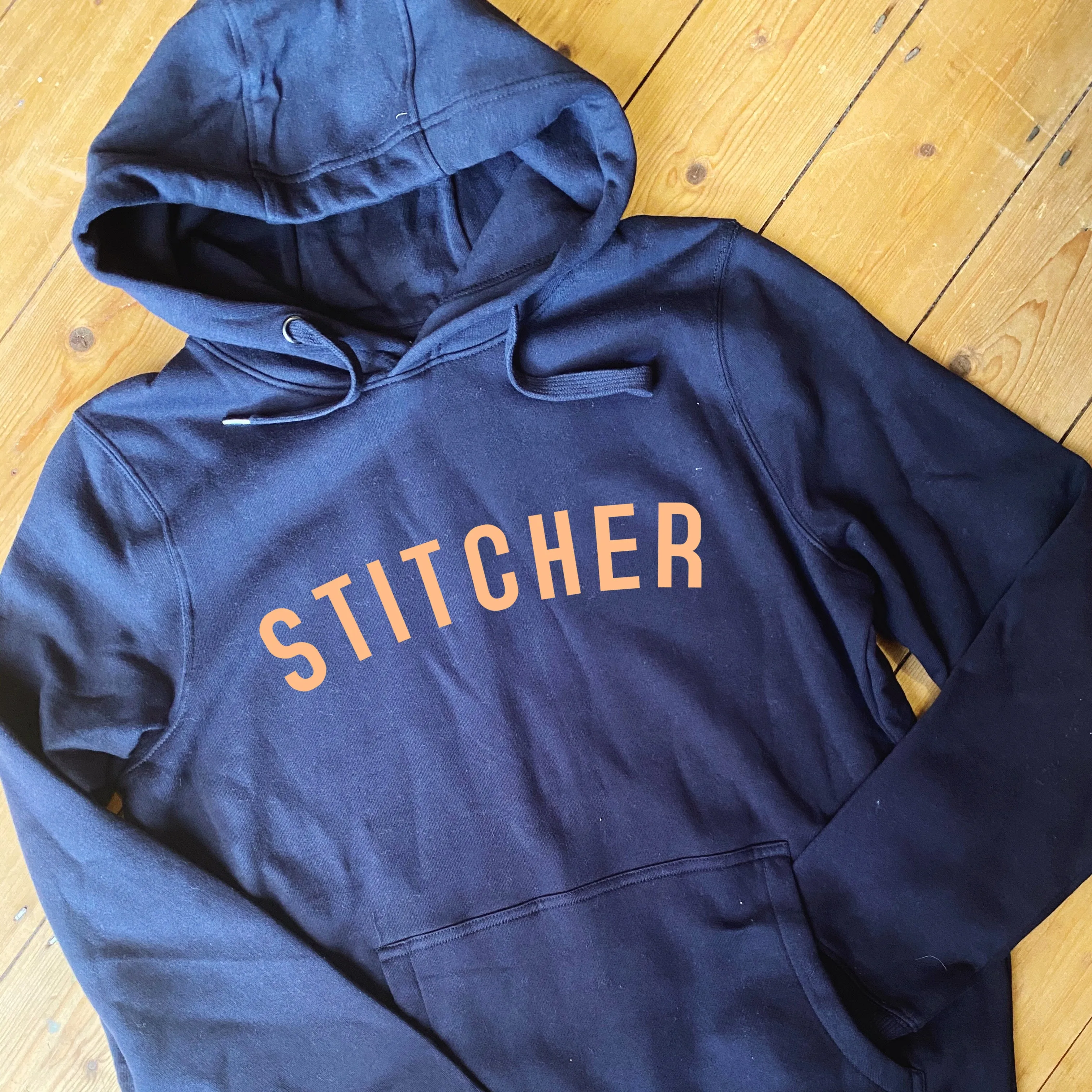 STITCHER Hoodie - 100% Organic Fairtrade Cotton - Pastel Font