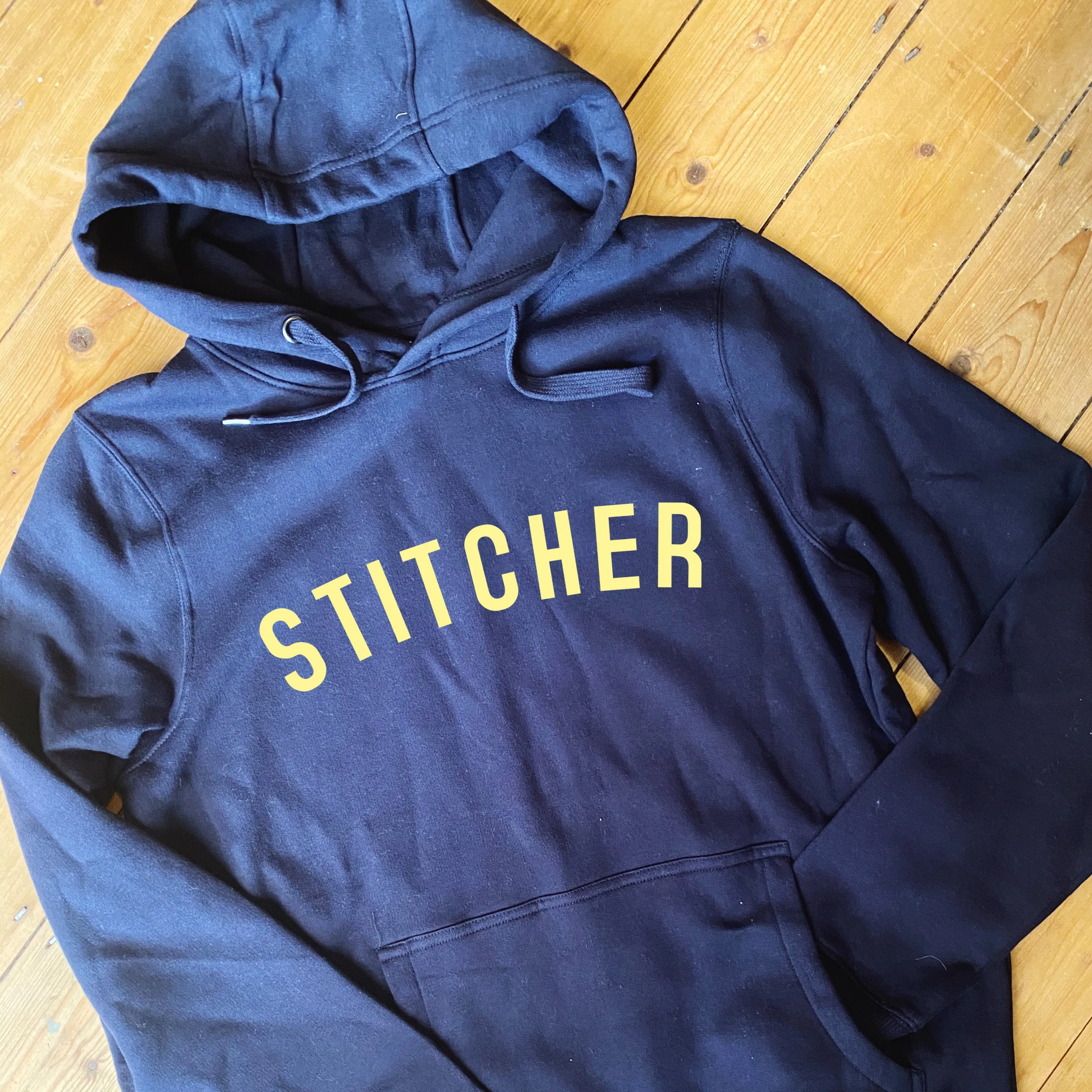 STITCHER Hoodie - 100% Organic Fairtrade Cotton - Pastel Font